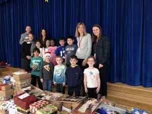 WOS students, teachers with Blizzard Box donations