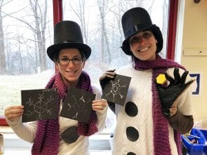 Teachers dressed as snowmen for lessons