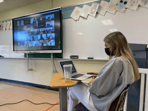 Student participating in virtual NYU WinC conference