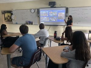 TZHS Spanish V student presenting on El Salvador