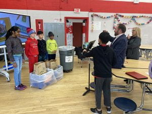 Fifth grade class films recycling videos