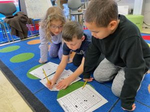 Second graders engaged in analogy activity